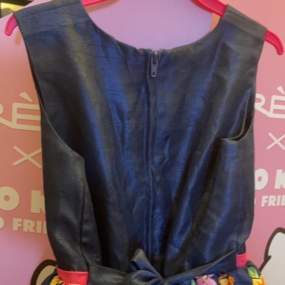 Blue dress with flower pattern on the skirt. - Picture 6 of 8